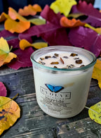 Hayride Rocks Candle - mandarin apple sweetgrass leather oak soy candle with Tiger Eye and Dalmatian Jasper on autumn leaves