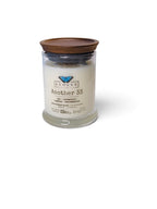 Evolve Botanica Another 33 6.5 oz soy sipper candle, crystal candle on white background, hand-poured in Marietta GA