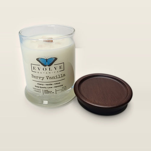 Evolve Botanica Berry Vanilla 6.5 oz soy sipper candle open with wood lid and crystals