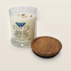 Evolve Botanica Cozy AF 6.5 oz soy sipper candle open with wood lid and crystals