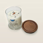Evolve Botanica Earl Grey at Midnight 6.5 oz soy sipper candle angled view with wood wick and crystals