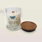 Evolve Botanica Golden Hour 6.5 oz soy sipper candle open with wood lid and crystals