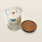Evolve Botanica Golden Hour 6.5 oz soy sipper candle angled view with wood wick and crystals