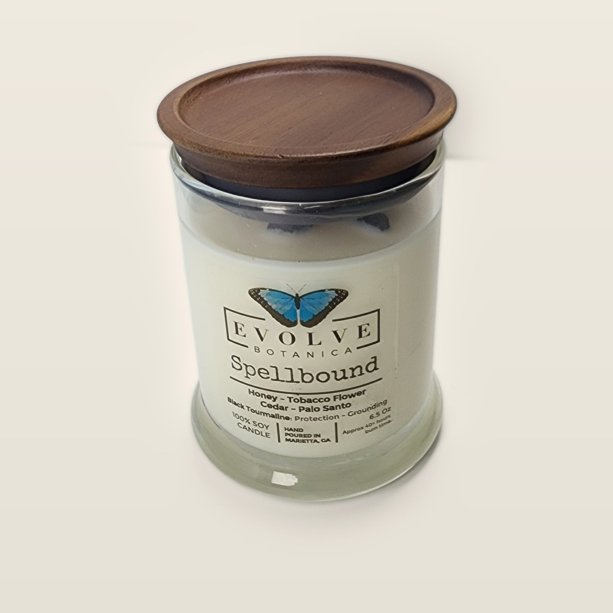 Evolve Botanica Spellbound 6.5 oz soy sipper candle with wood lid, hand-poured in Marietta GA