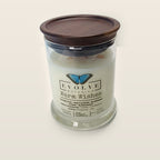 Evolve Botanica Warm Wishes 6.5 oz soy sipper candle with wood lid, hand-poured in Marietta GA