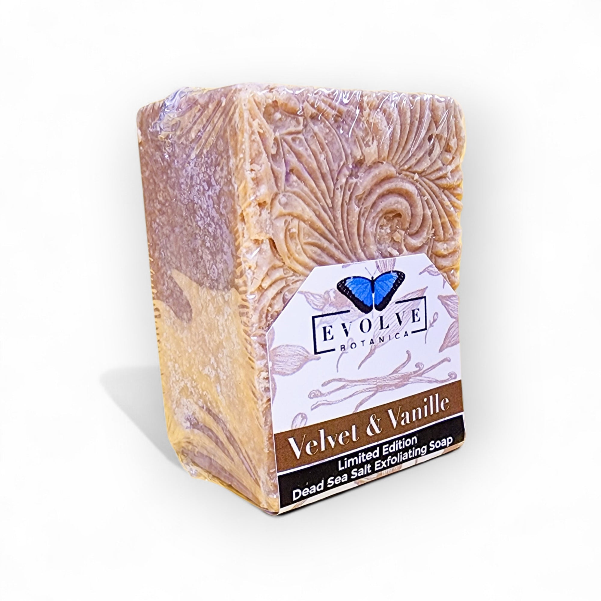 Bar of soap with decorative packaging featuring 'Evolve Botanics' on a white background