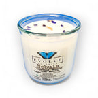 Nebula wood wick soy candle lit — celestial vanilla and cedar atmosphere