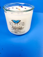 Nebula Rocks candle side view showing Sodalite crystal in soy wax
