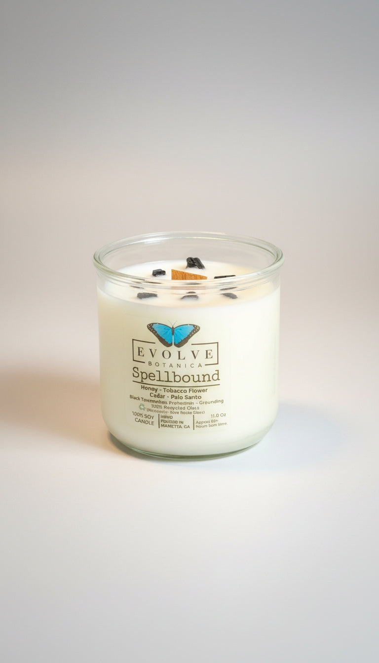 Spellbound Rocks candle side view showing Black Tourmaline crystal embedded in soy wax
