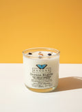 Evolve Botanica Havana Nights Rocks Candle — wood wick soy candle topped with Crazy Lace Agate and Onyx, scented with teak, tobacco leaf, sandalwood, black peppercorn and amber