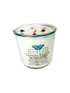 Evolve Botanica Havana Nights Rocks Candle — wood wick soy candle topped with Crazy Lace Agate and Onyx, scented with teak, tobacco leaf, sandalwood, black peppercorn and amber