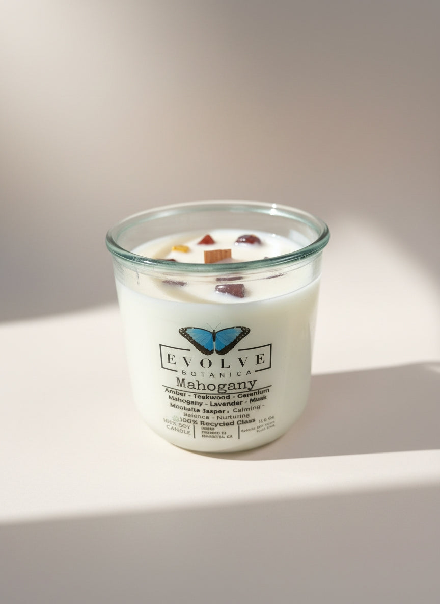 Evolve Botanica Mahogany Rocks Candle — wood wick soy candle topped with Mookaite Jasper, scented with amber, teakwood, mahogany, geranium, lavender and musk