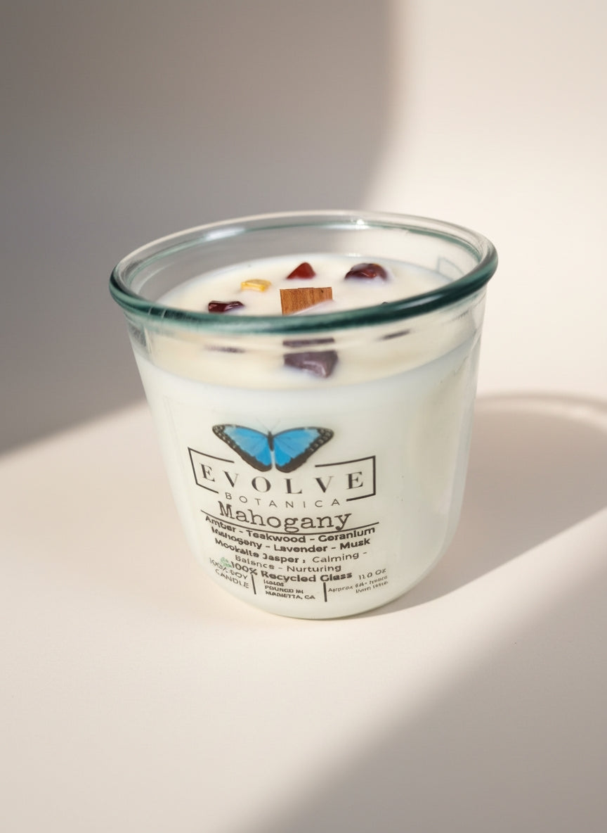 Evolve Botanica Mahogany Rocks Candle — wood wick soy candle topped with Mookaite Jasper, scented with amber, teakwood, mahogany, geranium, lavender and musk
