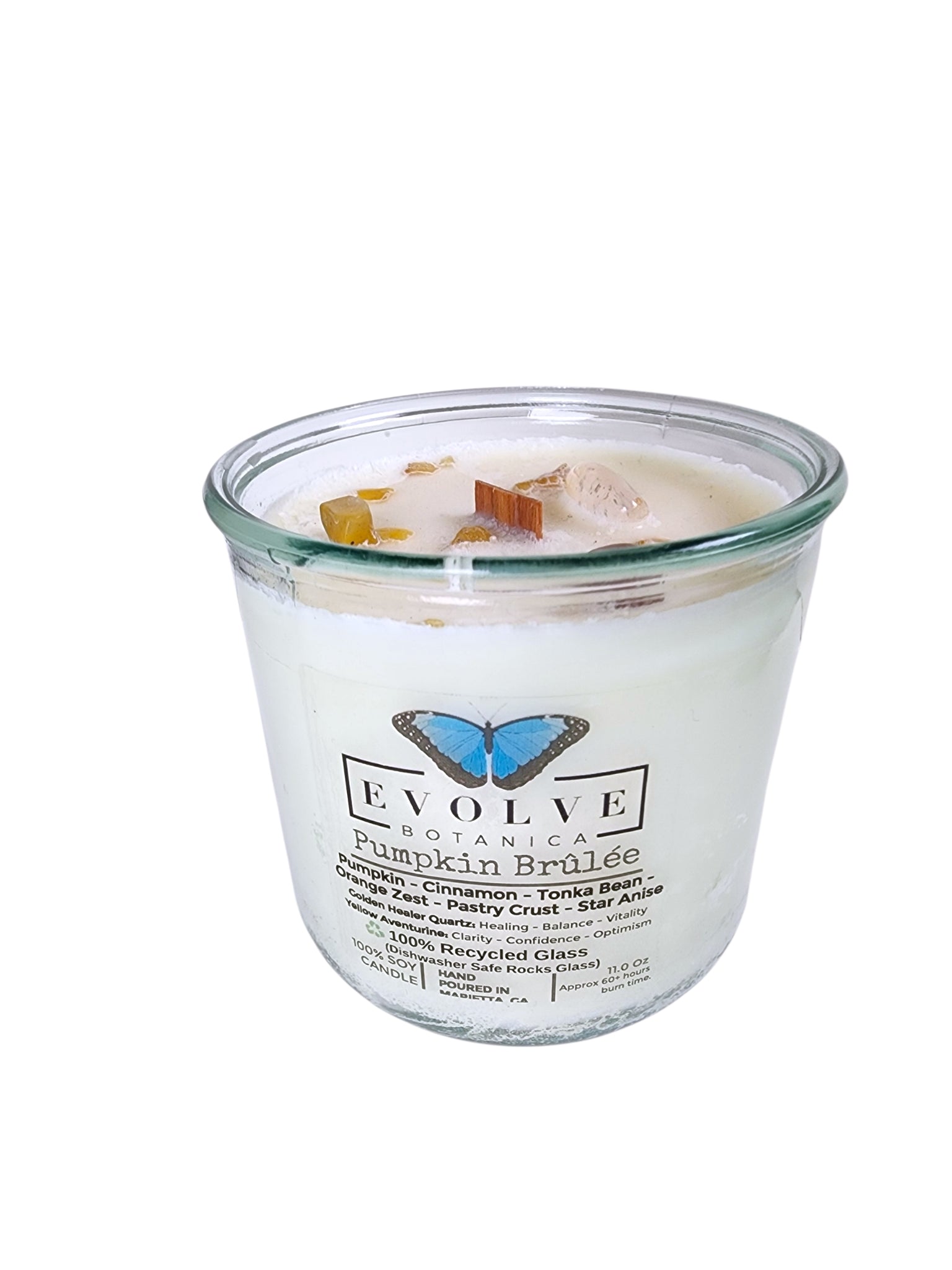 Evolve Botanica Pumpkin Brulee Rocks Candle — wood wick soy candle topped with Golden Healer Quartz and Yellow Aventurine, scented with pumpkin, cinnamon, tonka bean, orange zest, pastry crust and star anise