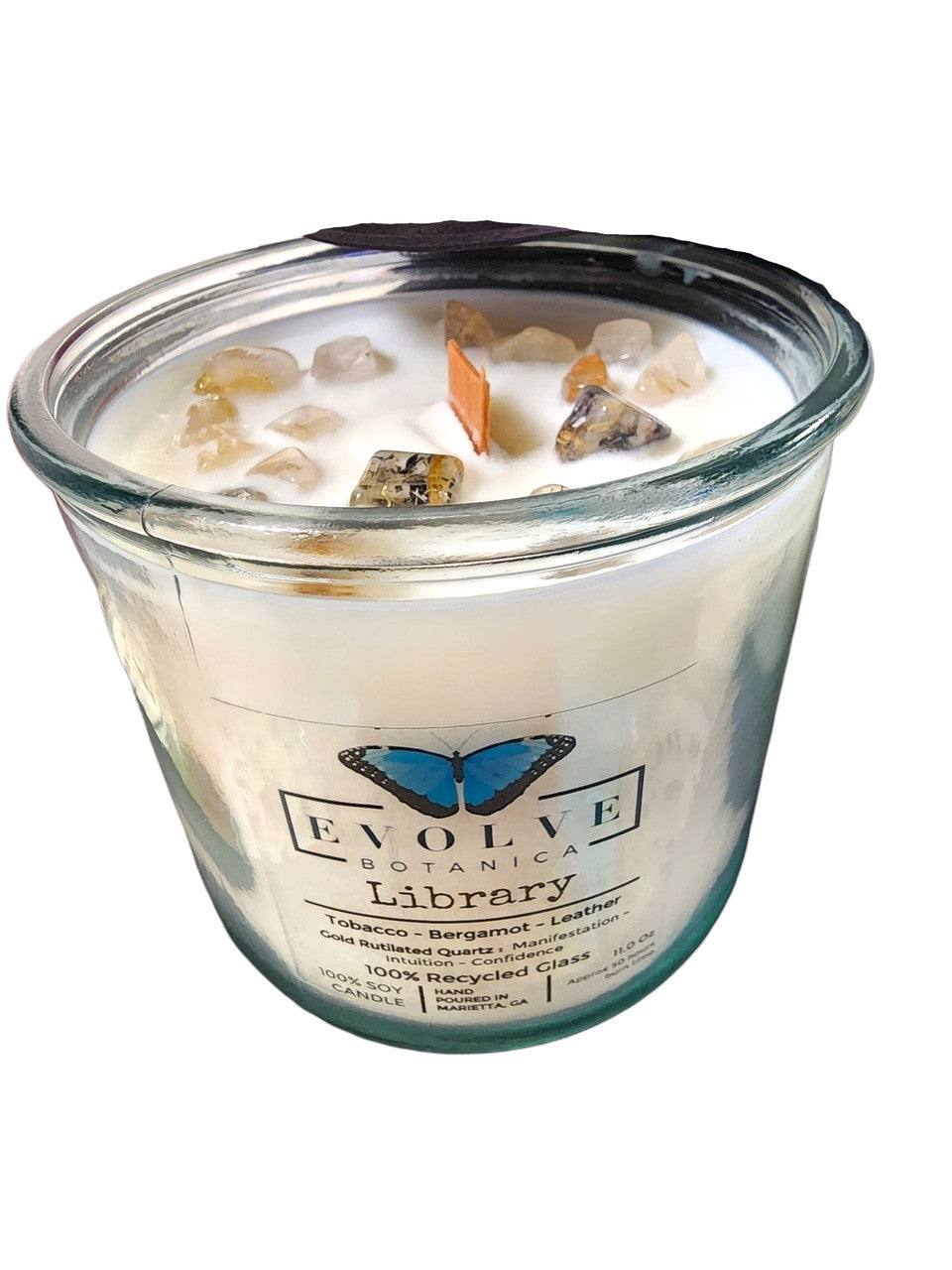Library Rocks candle side view showing Gold Rutilated Quartz in soy wax