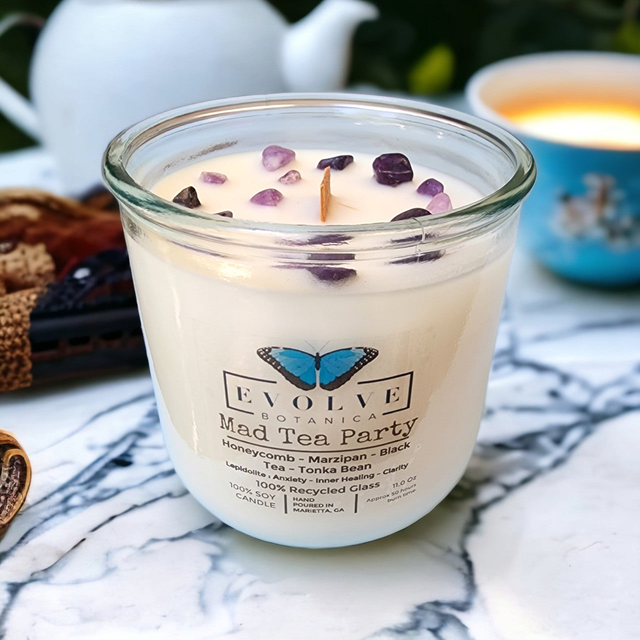 Mad Tea Party candle top-down — wood wick, lavender Lepidolite crystal-topped
