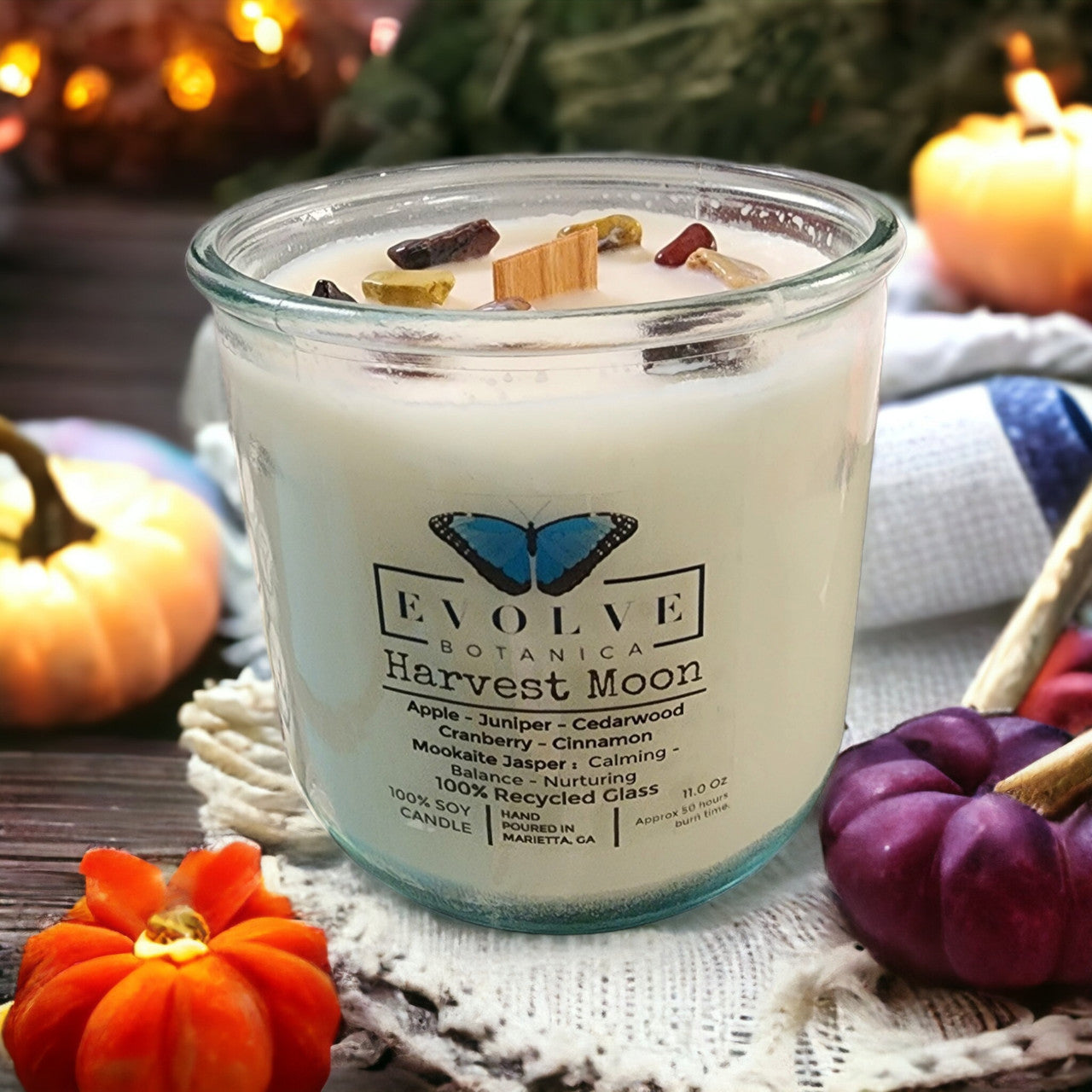 Harvest Moon Rocks candle styled with autumn leaves — fall harvest home decor
