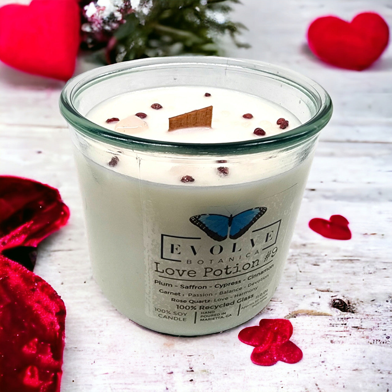 Love Potion #9 candle top-down — wood wick, love-themed crystal duo