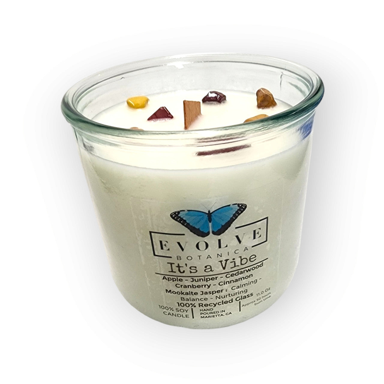 It's a Vibe wood wick soy candle lit — confident creative atmosphere
