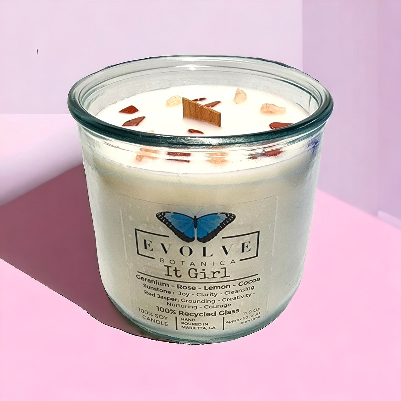 It Girl Rocks candle side view showing Sunstone & Red Jasper crystals
