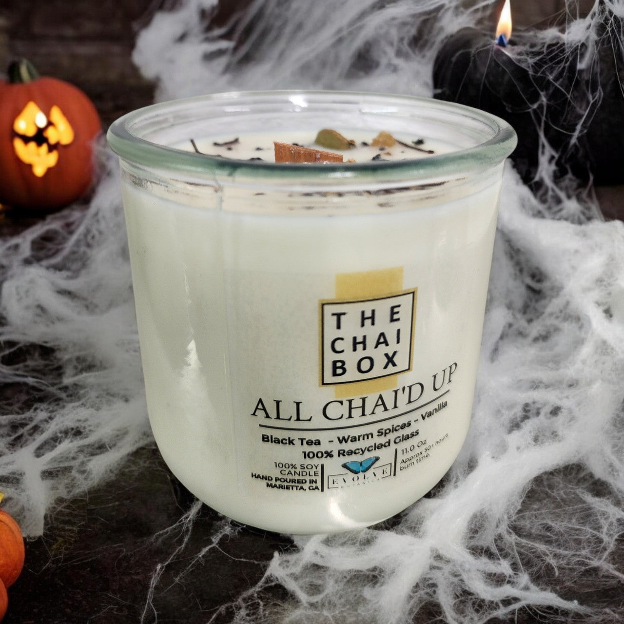 Evolve Botanica All Chai'd Up Rocks Candle — wood wick soy candle topped with loose All Chai'd Up chai (Chai Box × Evolve Botanica collab)