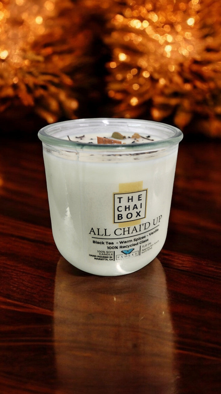 All Chai'd Up candle pictured with mug accents — chai latte inspired