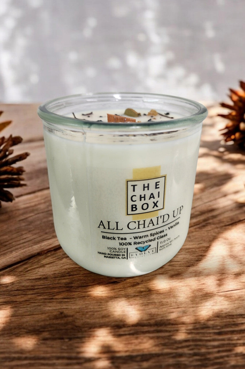 All Chai'd Up Rocks candle styled with chai accents — cozy morning decor
