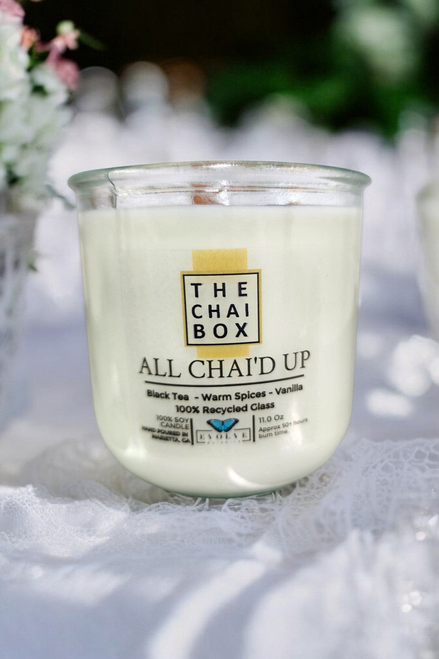 All Chai'd Up candle top-down — wood wick, loose chai topped, Chai Box × Evolve Botanica collab