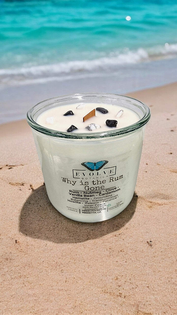 Evolve Botanica Rocks Candle - Why Is The Rum Gone? (Wood Wick, Hematite (Grounding, Balancing, Transformation), Howlite (Release, Patience, Inner Peace)