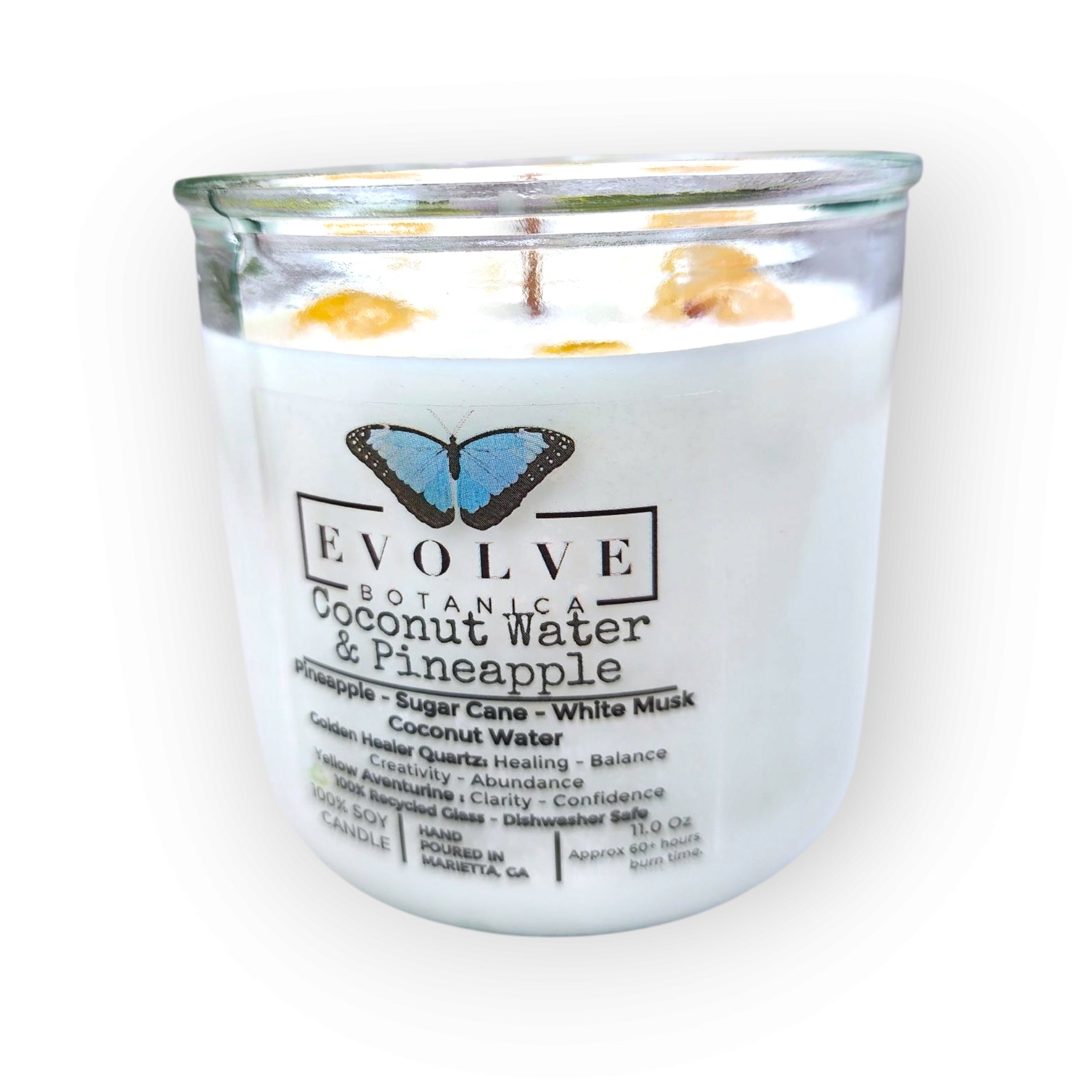 Evolve Botanica Coconut & Pineapple Rocks Candle — wood wick soy candle topped with Golden Healer Quartz and Yellow Aventurine, scented with pineapple, sugar cane and white musk