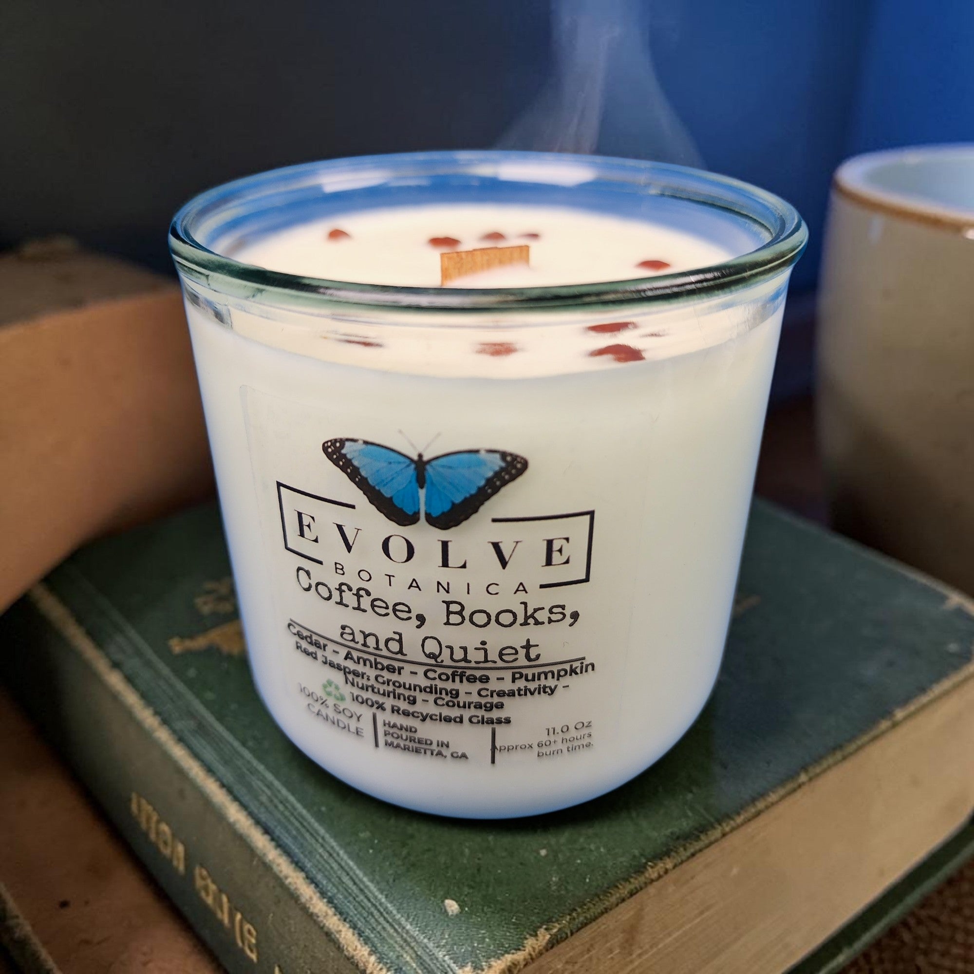 Coffee Books & Quiet Rocks candle side view showing Red Jasper in soy wax