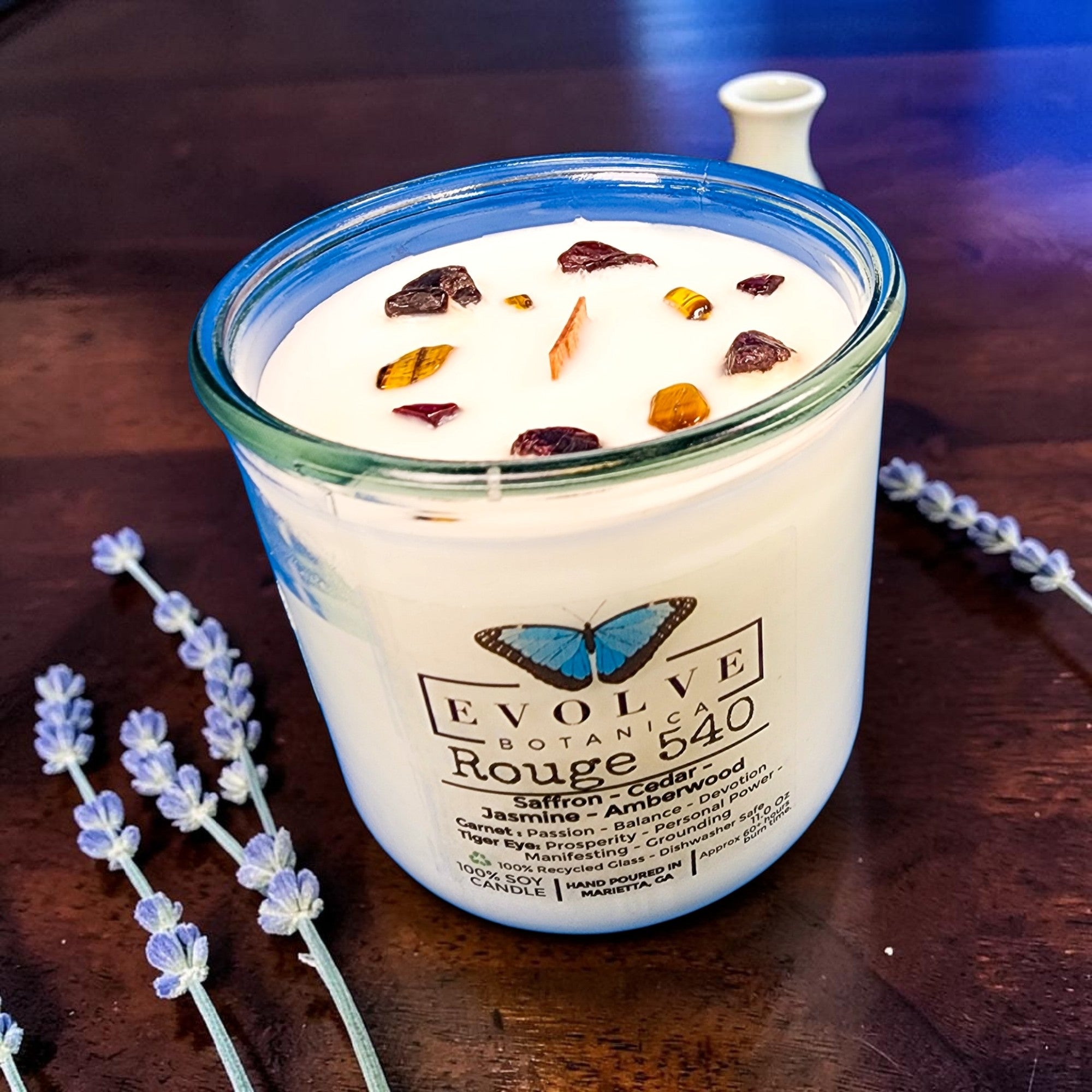 Evolve Botanica Rouge 540 Rocks Candle — wood wick soy candle topped with Garnet and Tiger Eye, scented with saffron, jasmine, cedar and amberwood