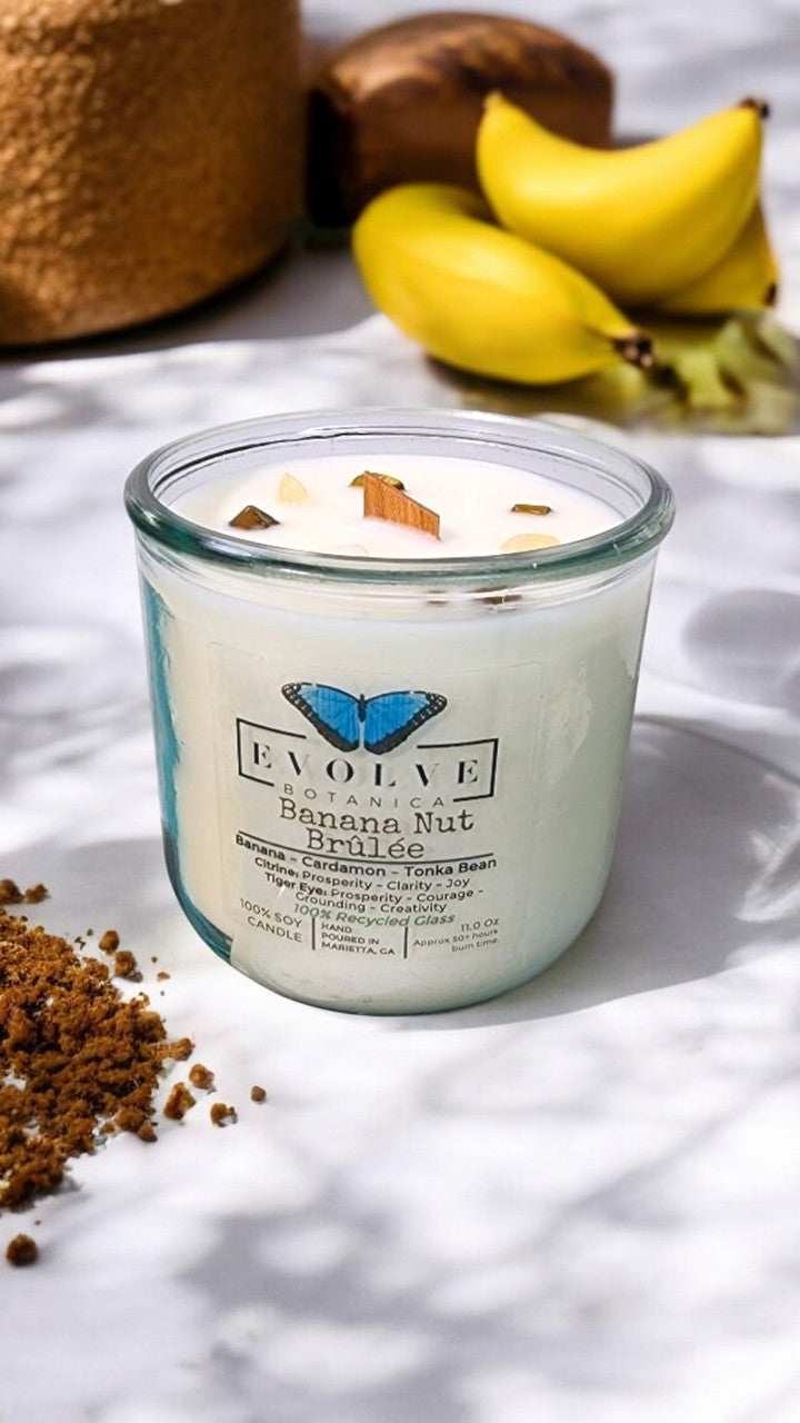 Banana Nut Brulee wood wick soy candle lit — warm bakery atmosphere