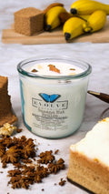 Banana Nut Brulee Rocks candle side view showing Citrine & Tiger Eye crystals