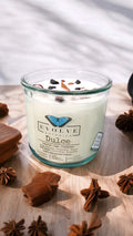 Dulce wood wick soy candle lit — warm caramel atmosphere
