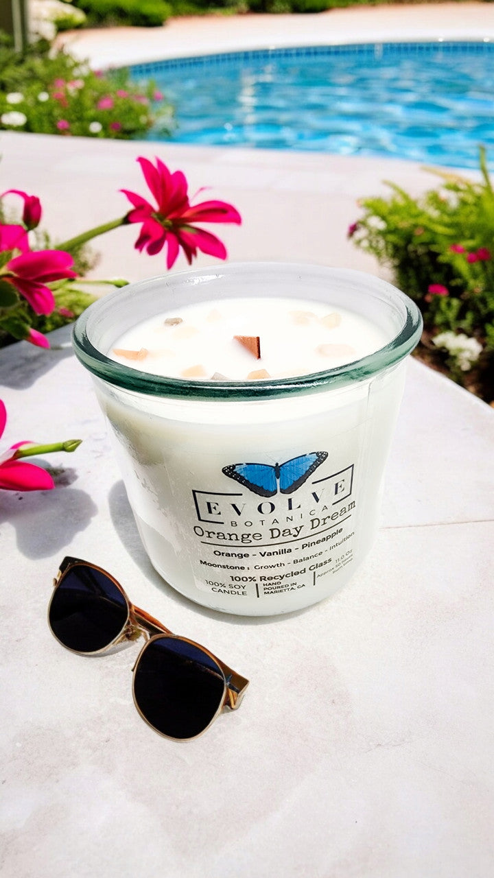 Orange Day Dream wood wick soy candle lit — bright sweet orange atmosphere
