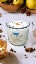 Spiced Pear & Cognac wood wick soy candle lit — sophisticated fall atmosphere