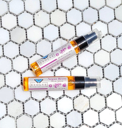 Argan Berry Facial Serum in 30ml glass dropper bottle — vivid orange color from cold-pressed sea buckthorn berry oil