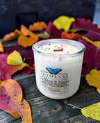 Saffron and Suede soy candle angled view in recycled glass