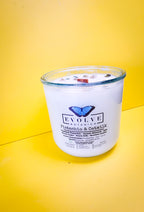 Pistachio and Oatmilk candle angled moody studio shot