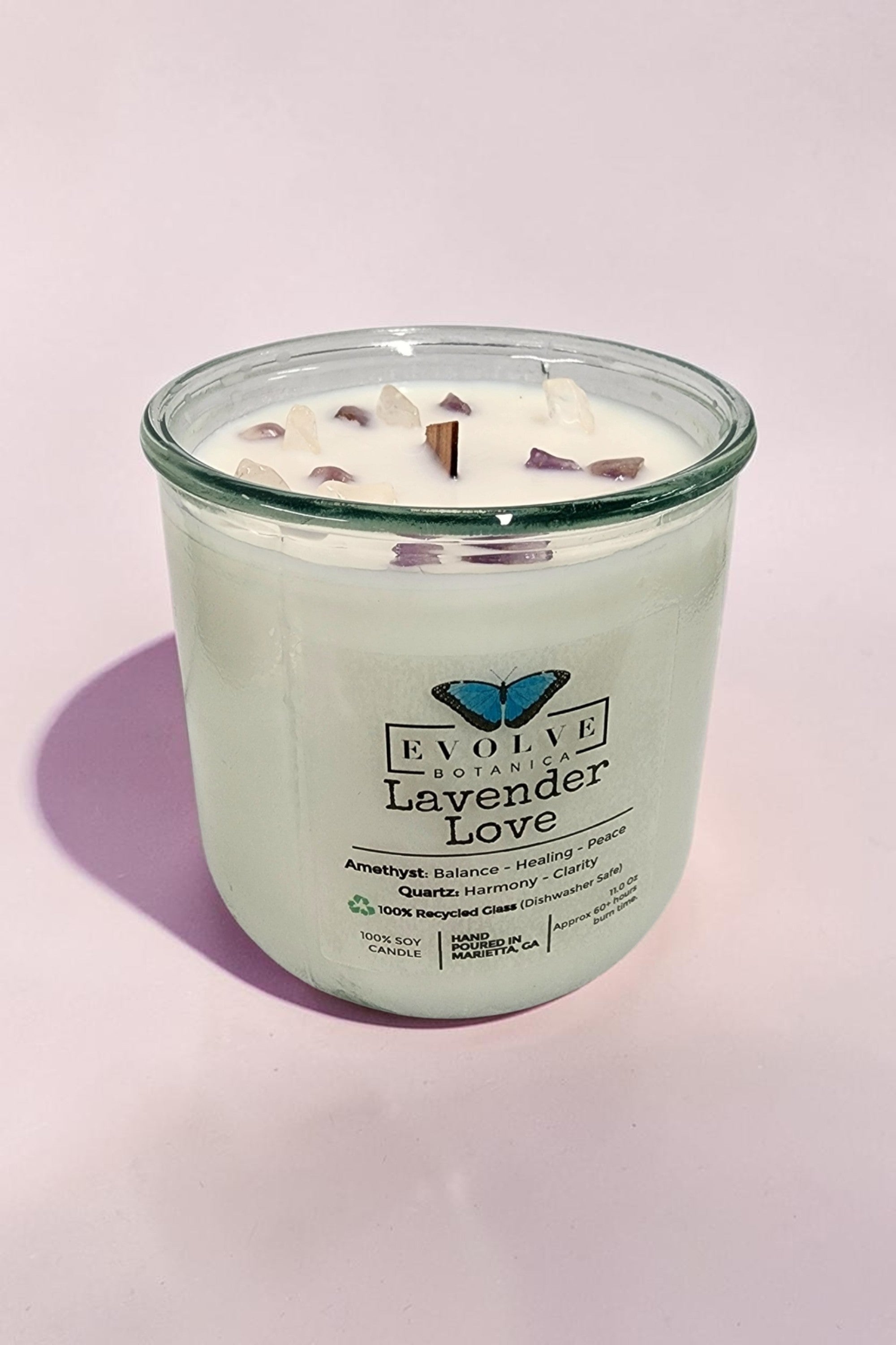 Lavender Love Rocks candle on soft pink — calming lavender wood wick soy candle with amethyst and quartz crystals, Evolve Botanica