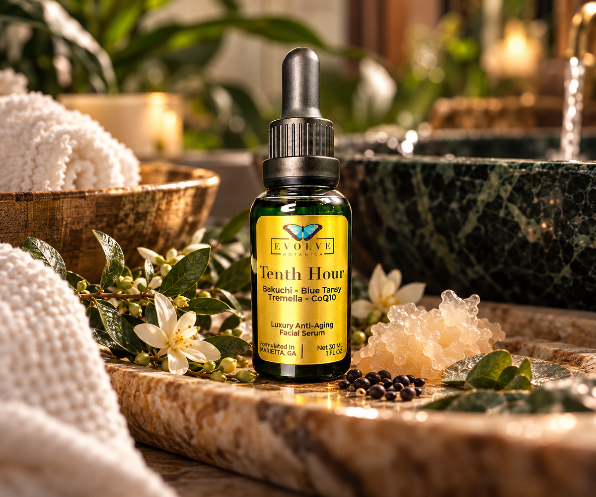 Tenth Hour luxury anti-aging facial serum styled with fresh jasmine blooms, Tremella mushroom extract, and green marble bowls for an evening skincare ritual