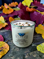 Hayride candle angled view on autumn leaves