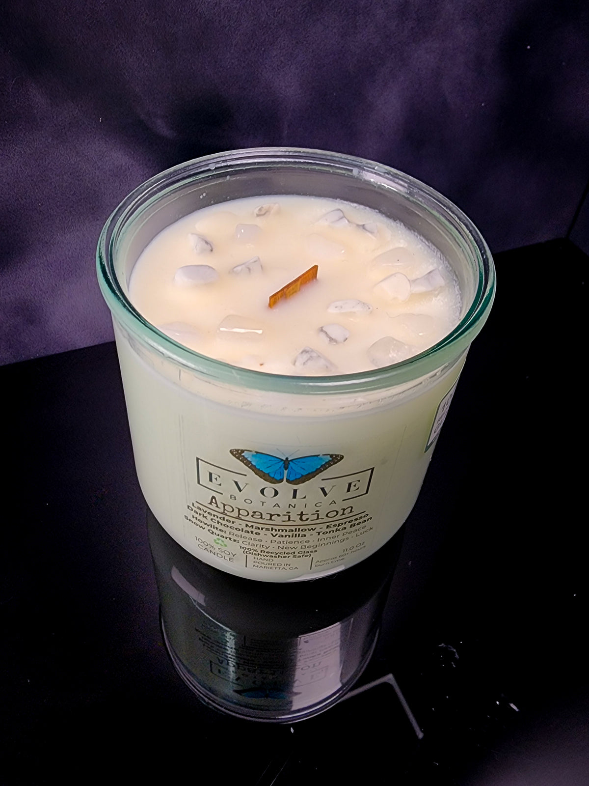 Apparition candle top view moody studio shot