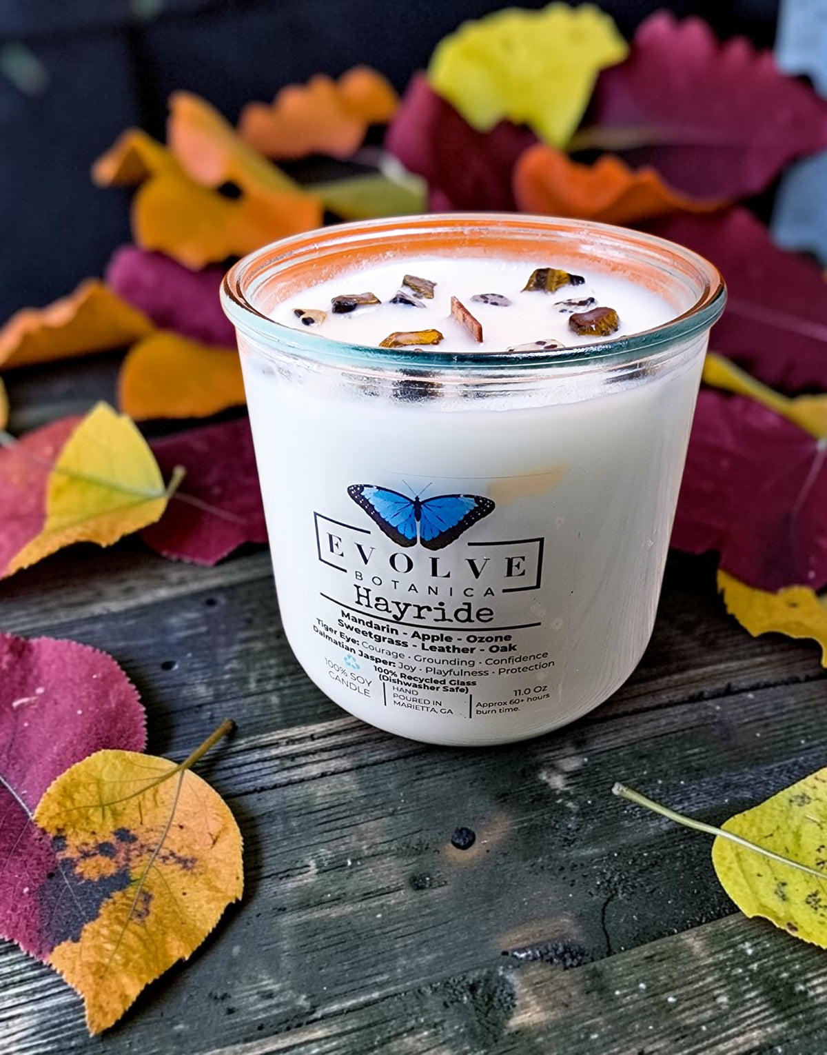 Hayride candle detail on autumn leaves