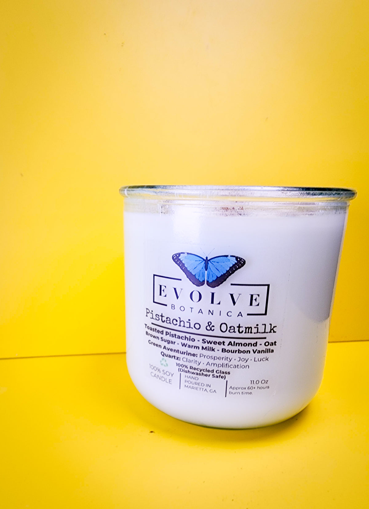 Pistachio and Oatmilk Rocks Candle moody studio shot