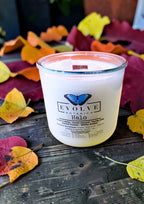 Halo gemstone candle front label on autumn leaves